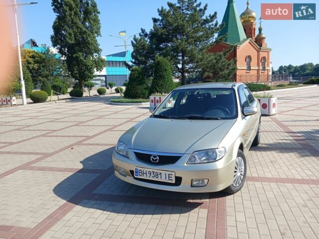 Серый Мазда 323, объемом двигателя 1.6 л и пробегом 320 тыс. км за 3600 $, фото 1 на Automoto.ua