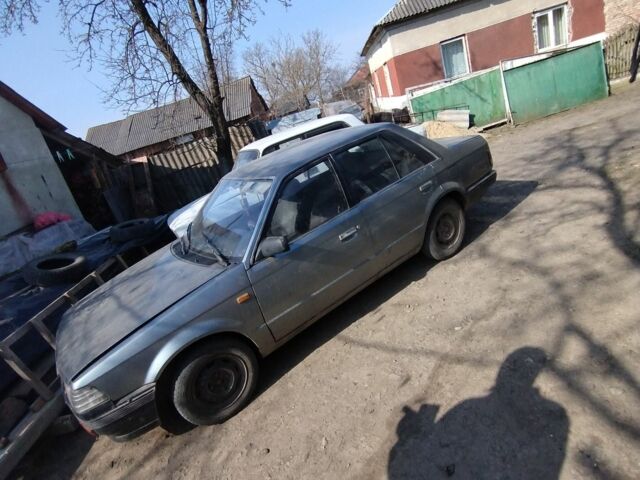 Сірий Мазда 323, об'ємом двигуна 1.5 л та пробігом 360 тис. км за 2500 $, фото 1 на Automoto.ua