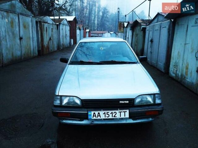 Серый Мазда 323, объемом двигателя 1.5 л и пробегом 215 тыс. км за 500 $, фото 1 на Automoto.ua