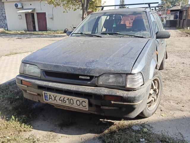Серый Мазда 323, объемом двигателя 1.6 л и пробегом 300 тыс. км за 996 $, фото 1 на Automoto.ua