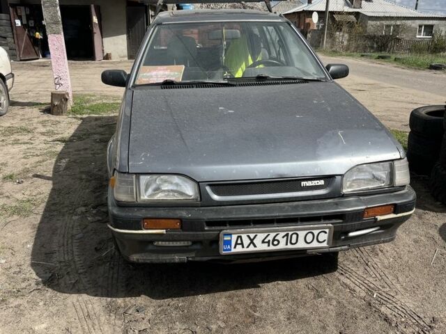 Серый Мазда 323, объемом двигателя 1.6 л и пробегом 320 тыс. км за 1200 $, фото 1 на Automoto.ua