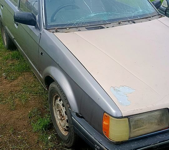 Сірий Мазда 323, об'ємом двигуна 1.7 л та пробігом 322 тис. км за 650 $, фото 1 на Automoto.ua