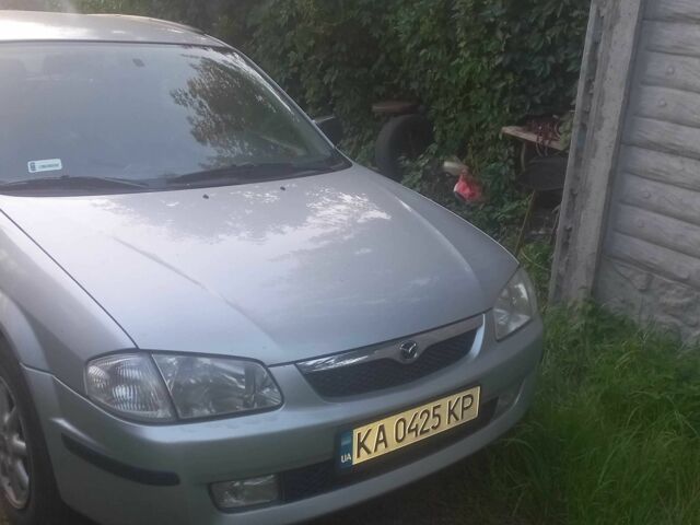 Серый Мазда 323, объемом двигателя 1.5 л и пробегом 150 тыс. км за 1300 $, фото 1 на Automoto.ua