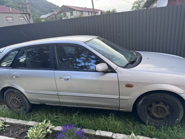 Сірий Мазда 323, об'ємом двигуна 2 л та пробігом 250 тис. км за 750 $, фото 1 на Automoto.ua