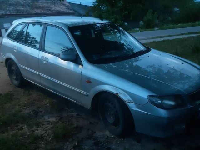 Серый Мазда 323, объемом двигателя 2 л и пробегом 200 тыс. км за 650 $, фото 1 на Automoto.ua