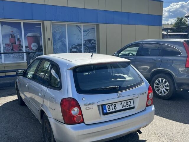 Серый Мазда 323, объемом двигателя 2 л и пробегом 223 тыс. км за 802 $, фото 1 на Automoto.ua