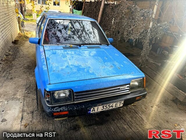 Синий Мазда 323, объемом двигателя 1.5 л и пробегом 0 тыс. км за 300 $, фото 1 на Automoto.ua