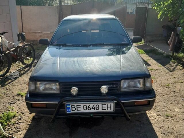 Синий Мазда 323, объемом двигателя 1.7 л и пробегом 463 тыс. км за 1500 $, фото 1 на Automoto.ua