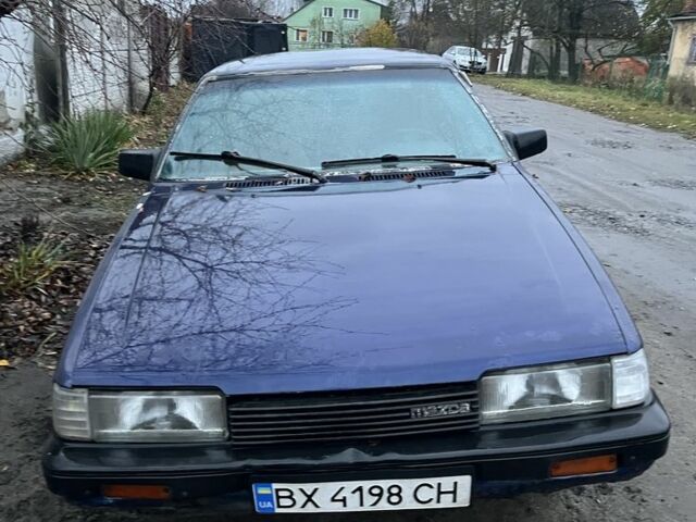 Синій Мазда 323, об'ємом двигуна 1.8 л та пробігом 200 тис. км за 350 $, фото 1 на Automoto.ua