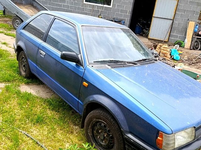 Синій Мазда 323, об'ємом двигуна 1.6 л та пробігом 500 тис. км за 700 $, фото 1 на Automoto.ua