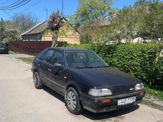 Синий Мазда 323, объемом двигателя 1.5 л и пробегом 3 тыс. км за 698 $, фото 1 на Automoto.ua