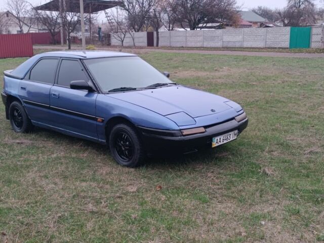 Синий Мазда 323, объемом двигателя 1.6 л и пробегом 260 тыс. км за 832 $, фото 1 на Automoto.ua