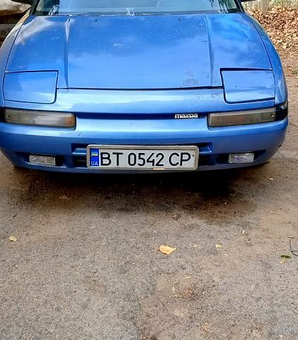 Синий Мазда 323, объемом двигателя 1.6 л и пробегом 188 тыс. км за 900 $, фото 1 на Automoto.ua