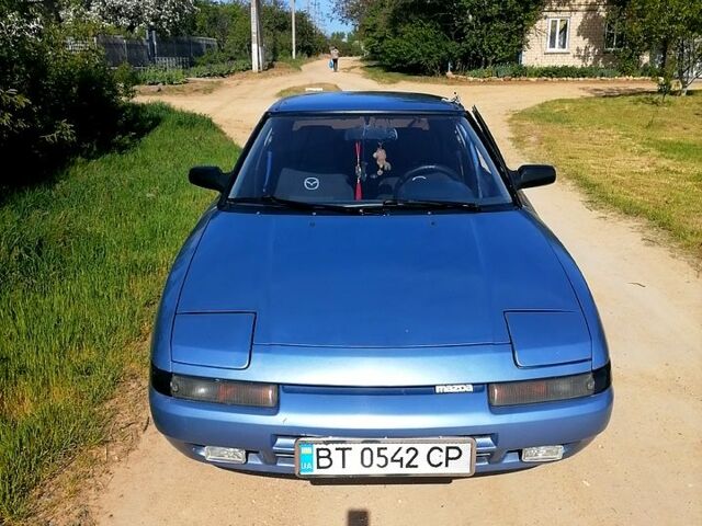 Синій Мазда 323, об'ємом двигуна 1.6 л та пробігом 0 тис. км за 1250 $, фото 1 на Automoto.ua