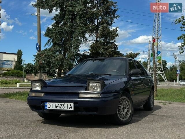 Синій Мазда 323, об'ємом двигуна 1.6 л та пробігом 250 тис. км за 1200 $, фото 1 на Automoto.ua