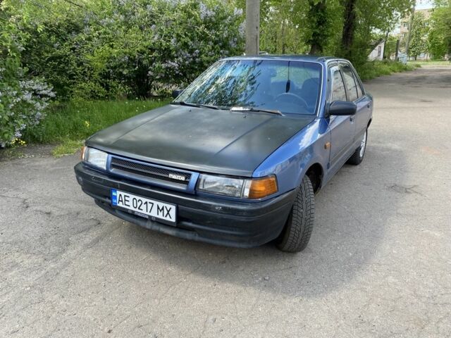 Синий Мазда 323, объемом двигателя 1.3 л и пробегом 600 тыс. км за 950 $, фото 1 на Automoto.ua