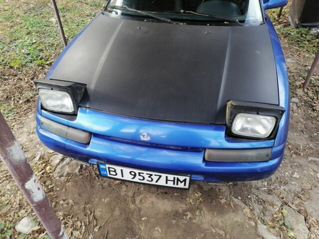 Синий Мазда 323, объемом двигателя 1.6 л и пробегом 10 тыс. км за 1426 $, фото 1 на Automoto.ua