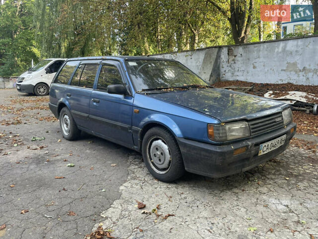 Синий Мазда 323, объемом двигателя 1.6 л и пробегом 500 тыс. км за 750 $, фото 1 на Automoto.ua
