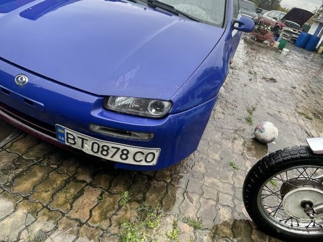 Синій Мазда 323, об'ємом двигуна 1.5 л та пробігом 100 тис. км за 1745 $, фото 1 на Automoto.ua