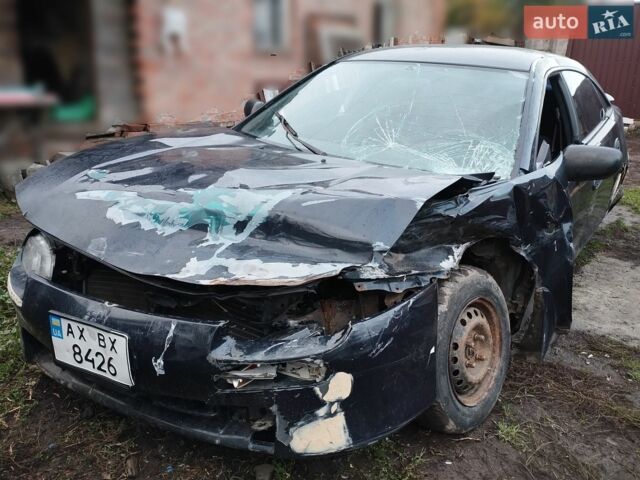 Синий Мазда 323, объемом двигателя 1.49 л и пробегом 100 тыс. км за 400 $, фото 1 на Automoto.ua