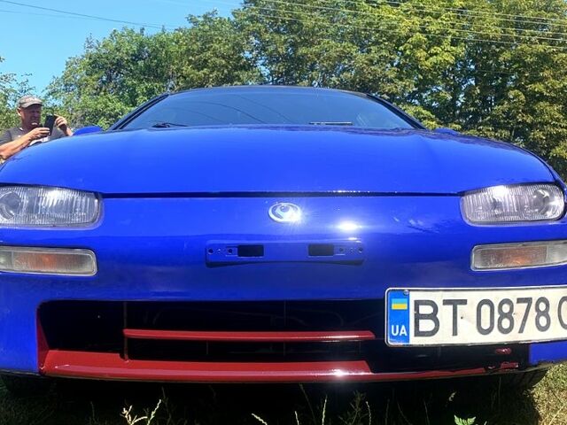 Синий Мазда 323, объемом двигателя 1.5 л и пробегом 340 тыс. км за 3000 $, фото 1 на Automoto.ua