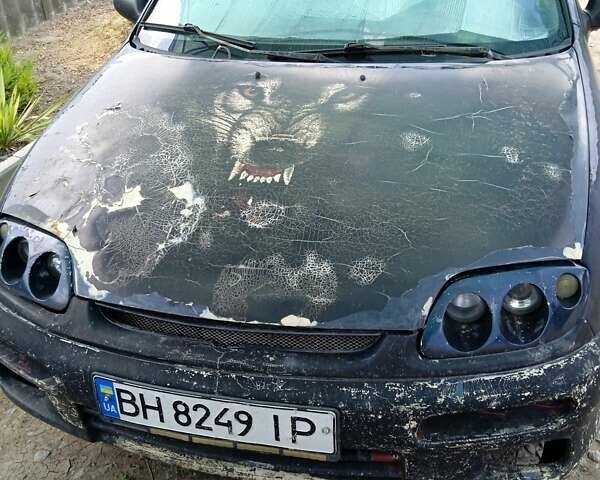 Синій Мазда 323, об'ємом двигуна 1.49 л та пробігом 437 тис. км за 1500 $, фото 1 на Automoto.ua