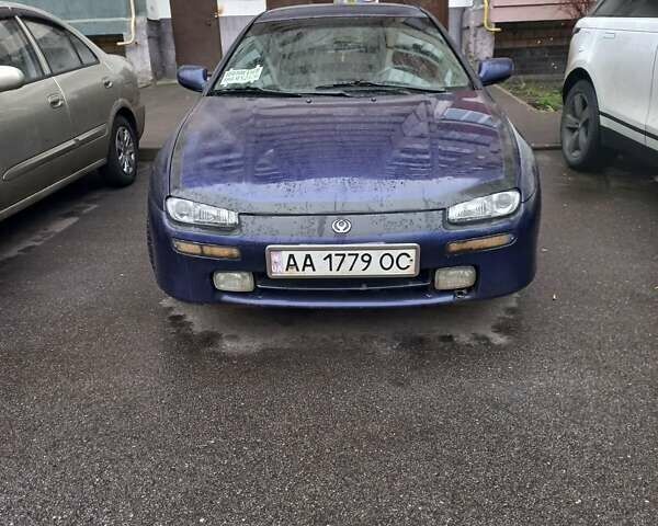 Синий Мазда 323, объемом двигателя 1.5 л и пробегом 350 тыс. км за 3300 $, фото 1 на Automoto.ua