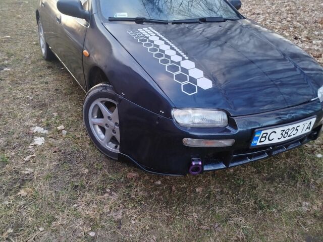 Синий Мазда 323, объемом двигателя 1.5 л и пробегом 300 тыс. км за 1700 $, фото 1 на Automoto.ua