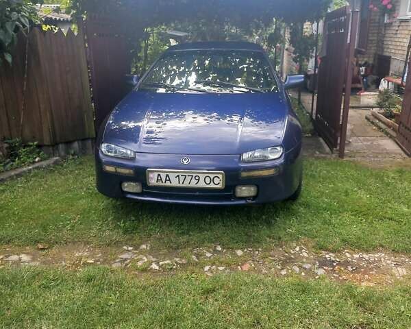 Синий Мазда 323, объемом двигателя 1.5 л и пробегом 350 тыс. км за 3300 $, фото 1 на Automoto.ua