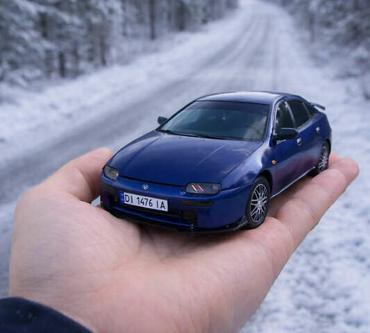 Синий Мазда 323, объемом двигателя 1.49 л и пробегом 286 тыс. км за 3000 $, фото 1 на Automoto.ua