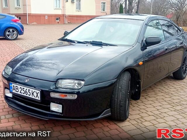 Синий Мазда 323, объемом двигателя 1.5 л и пробегом 270 тыс. км за 2500 $, фото 1 на Automoto.ua