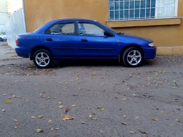 Синий Мазда 323, объемом двигателя 1.5 л и пробегом 0 тыс. км за 1500 $, фото 1 на Automoto.ua