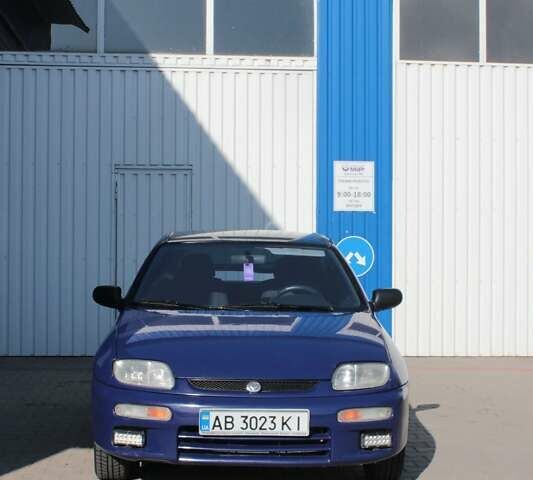 Синий Мазда 323, объемом двигателя 1.3 л и пробегом 400 тыс. км за 2200 $, фото 1 на Automoto.ua