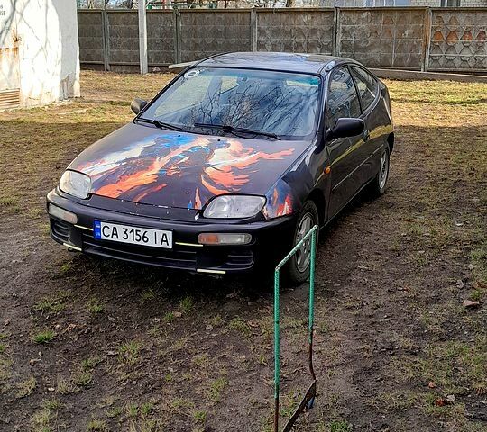 Синий Мазда 323, объемом двигателя 1.5 л и пробегом 0 тыс. км за 2000 $, фото 1 на Automoto.ua