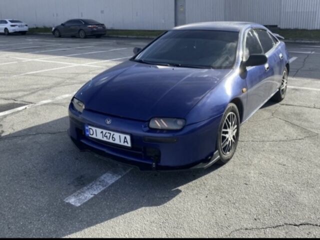 Синий Мазда 323, объемом двигателя 1.5 л и пробегом 120 тыс. км за 2350 $, фото 1 на Automoto.ua