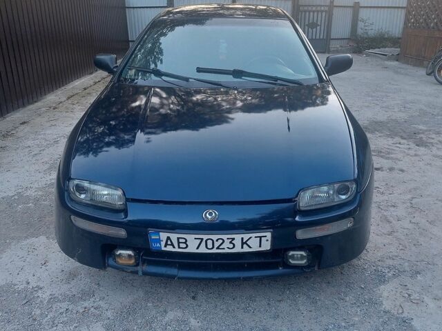 Синій Мазда 323, об'ємом двигуна 1.5 л та пробігом 195 тис. км за 1200 $, фото 1 на Automoto.ua