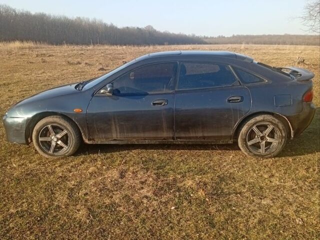 Синій Мазда 323, об'ємом двигуна 1.5 л та пробігом 200 тис. км за 1300 $, фото 1 на Automoto.ua