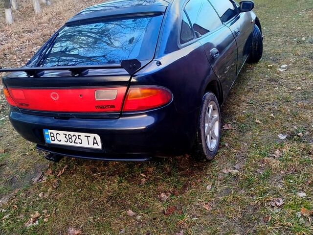 Синий Мазда 323, объемом двигателя 1.5 л и пробегом 340 тыс. км за 1700 $, фото 1 на Automoto.ua