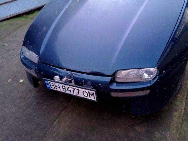 Синий Мазда 323, объемом двигателя 1.5 л и пробегом 235 тыс. км за 1600 $, фото 1 на Automoto.ua