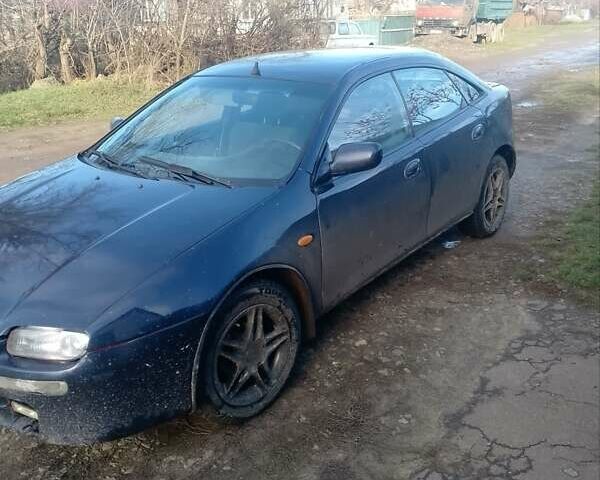 Синий Мазда 323, объемом двигателя 1.49 л и пробегом 521 тыс. км за 1400 $, фото 1 на Automoto.ua