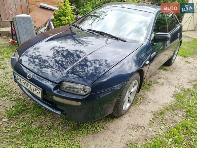 Синий Мазда 323, объемом двигателя 1.5 л и пробегом 305 тыс. км за 2300 $, фото 1 на Automoto.ua