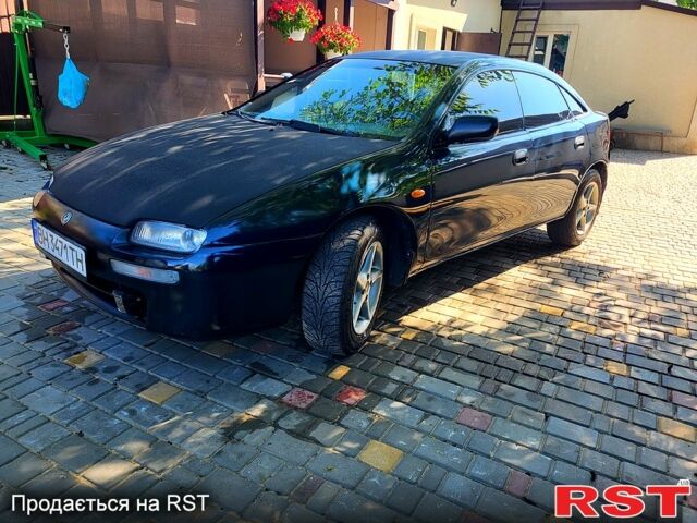 Синий Мазда 323, объемом двигателя 1.5 л и пробегом 0 тыс. км за 1700 $, фото 1 на Automoto.ua