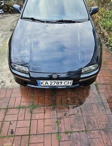 Синий Мазда 323, объемом двигателя 1.5 л и пробегом 237 тыс. км за 2200 $, фото 1 на Automoto.ua