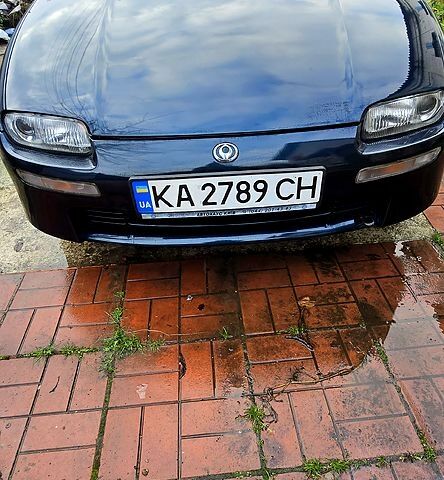 Синий Мазда 323, объемом двигателя 1.5 л и пробегом 237 тыс. км за 2100 $, фото 1 на Automoto.ua