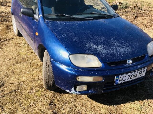Синий Мазда 323, объемом двигателя 1.5 л и пробегом 258 тыс. км за 1250 $, фото 1 на Automoto.ua