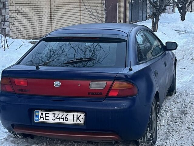 Синий Мазда 323, объемом двигателя 1.5 л и пробегом 3 тыс. км за 700 $, фото 1 на Automoto.ua