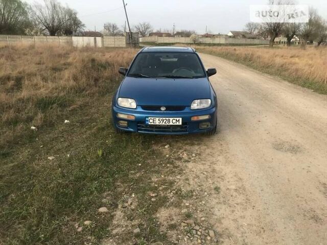 Синий Мазда 323, объемом двигателя 1.5 л и пробегом 600 тыс. км за 1550 $, фото 1 на Automoto.ua