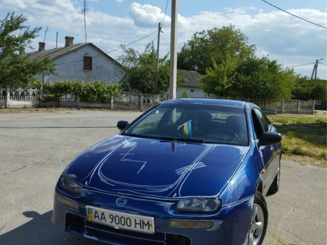 Синий Мазда 323, объемом двигателя 1 л и пробегом 200 тыс. км за 2000 $, фото 1 на Automoto.ua