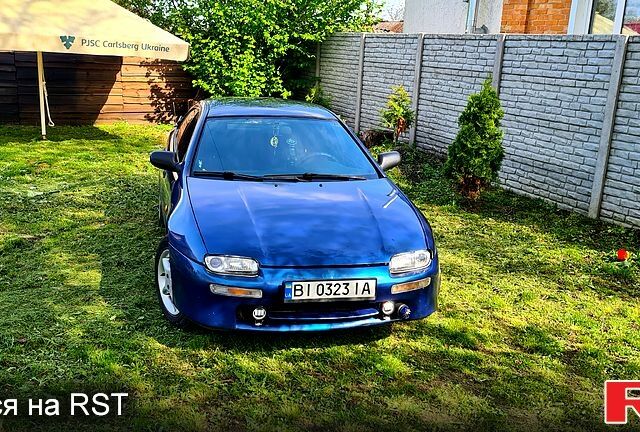 Синий Мазда 323, объемом двигателя 1.5 л и пробегом 330 тыс. км за 2200 $, фото 1 на Automoto.ua