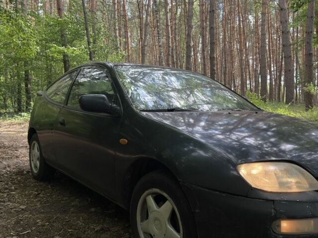 Синій Мазда 323, об'ємом двигуна 1.5 л та пробігом 369 тис. км за 930 $, фото 1 на Automoto.ua